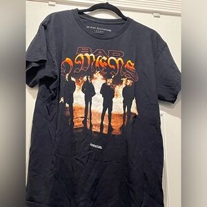Bad omens face in the fire shirt